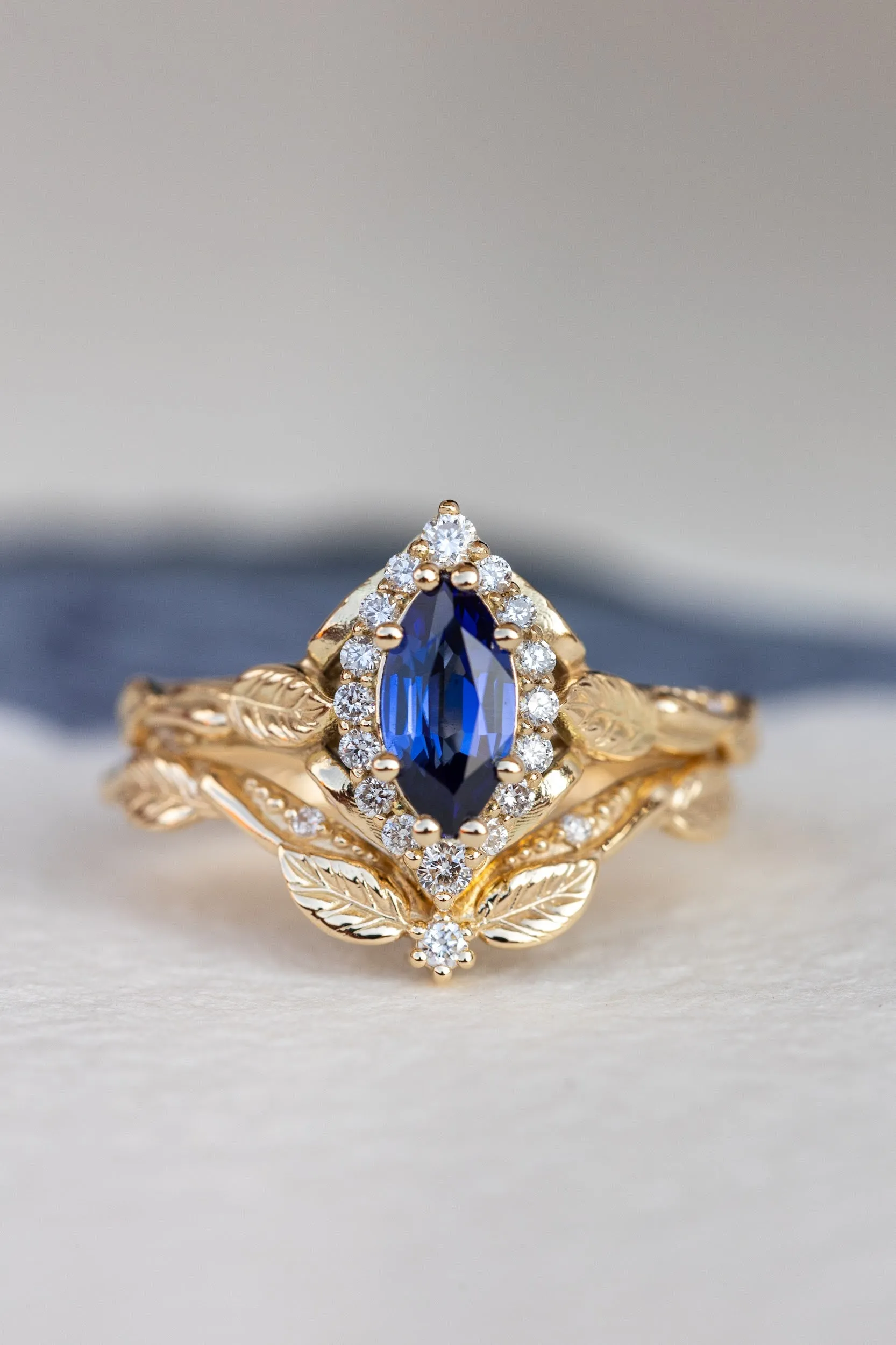 Dark blue lab sapphire engagement ring, gold proposal ring with marquise cut gemstone and diamond halo / Florentina