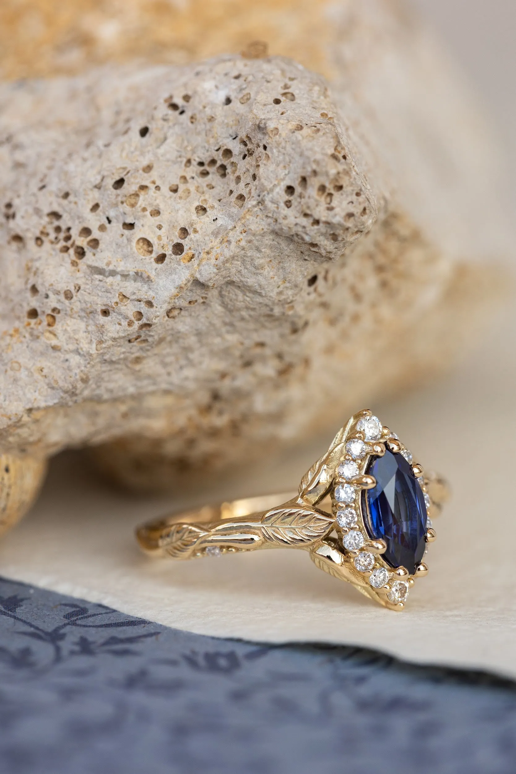 Dark blue lab sapphire engagement ring, gold proposal ring with marquise cut gemstone and diamond halo / Florentina